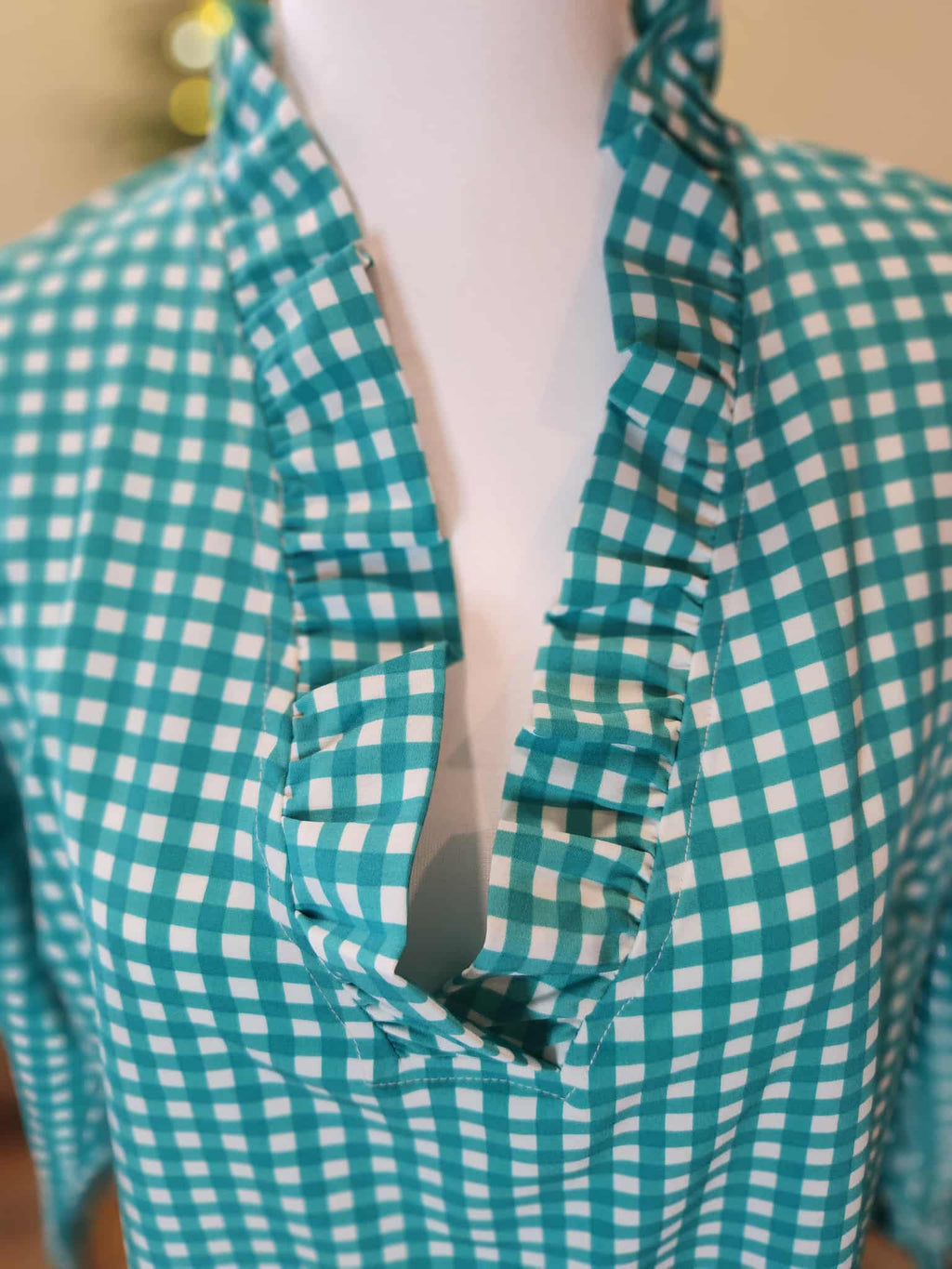 Ruffle tunic in green & white gingham